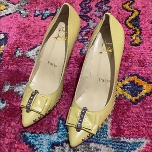 Pale yellow studded Christian Louboutin heels